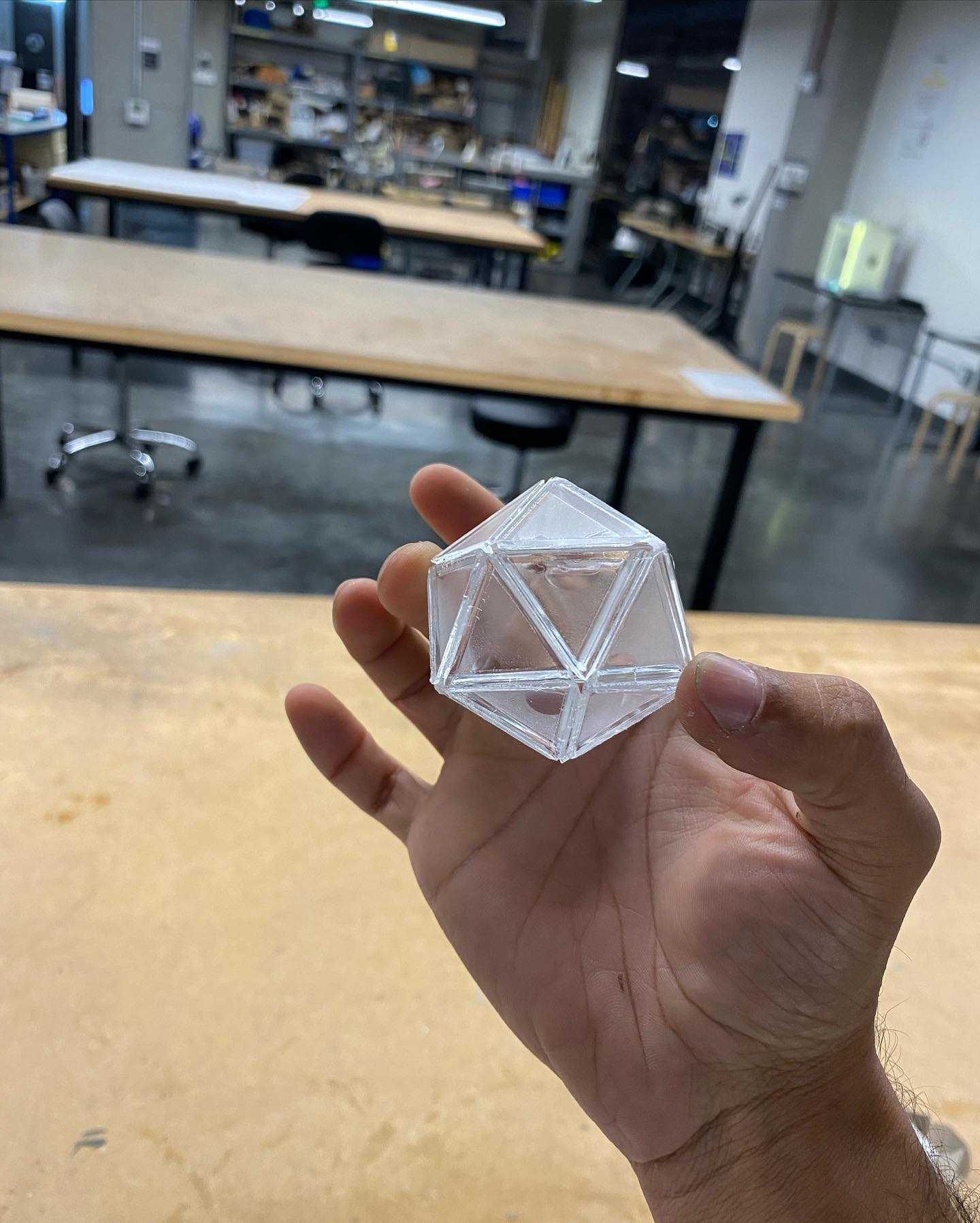 Inspired by a fellow laser cutter enthusiast at the shop building some tessellated sculptures, I started experimenting with defocusing the laser cutter to make foldable structures. A few hours of iteration later, I had a foldable icosahedron! One day this will make complex polyhedral infinity mirror sculptures much easier to put together.